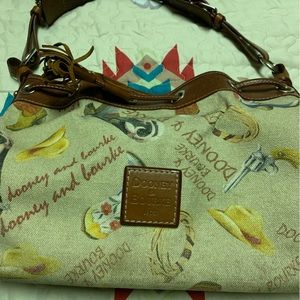 Very used Dooney and Burk Western Purse